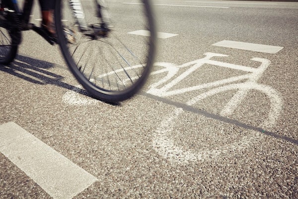 One of the new 2020 California laws allows bicycles to go straight at an intersection from the left- or right-hand turn lane, provided that they have right-of-way.