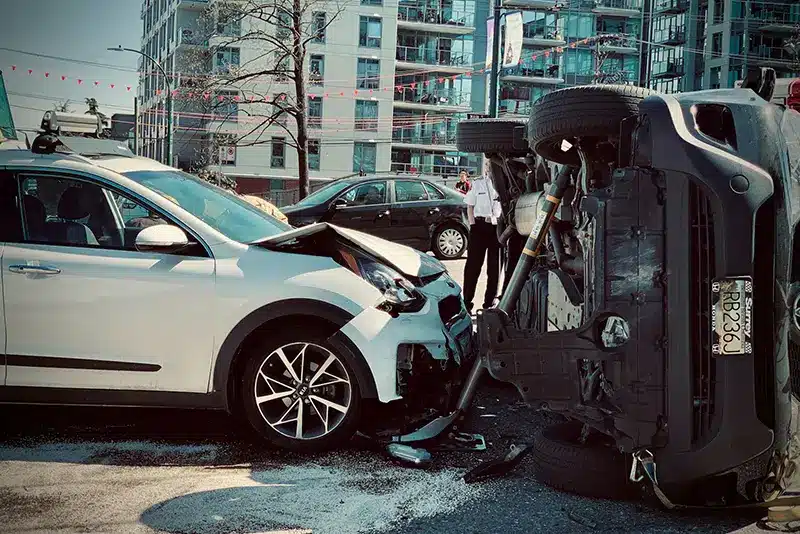 Damaged vehicles on Los Angeles street highlighting need for legal help after a serious car accident