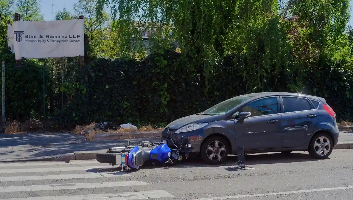 Motorcycle headon collision with car