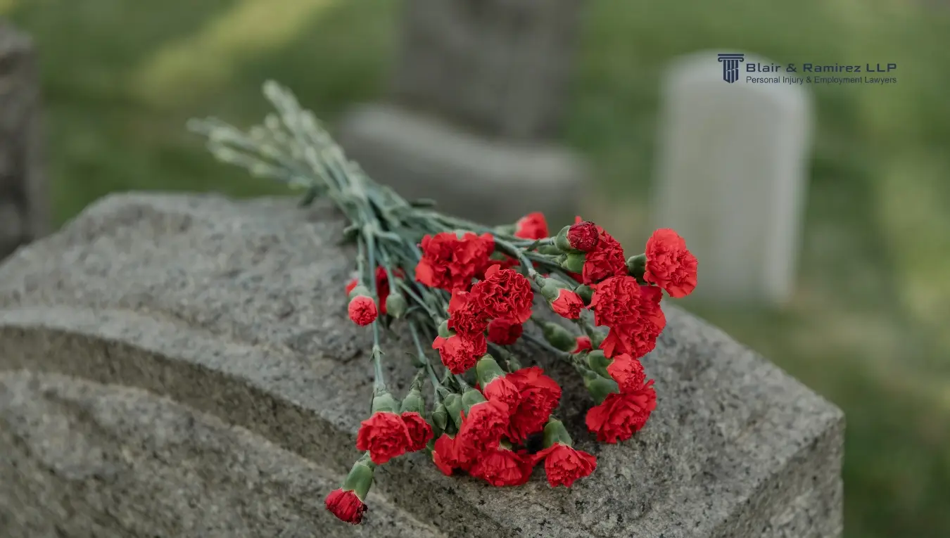 Rose on top of a grave stone