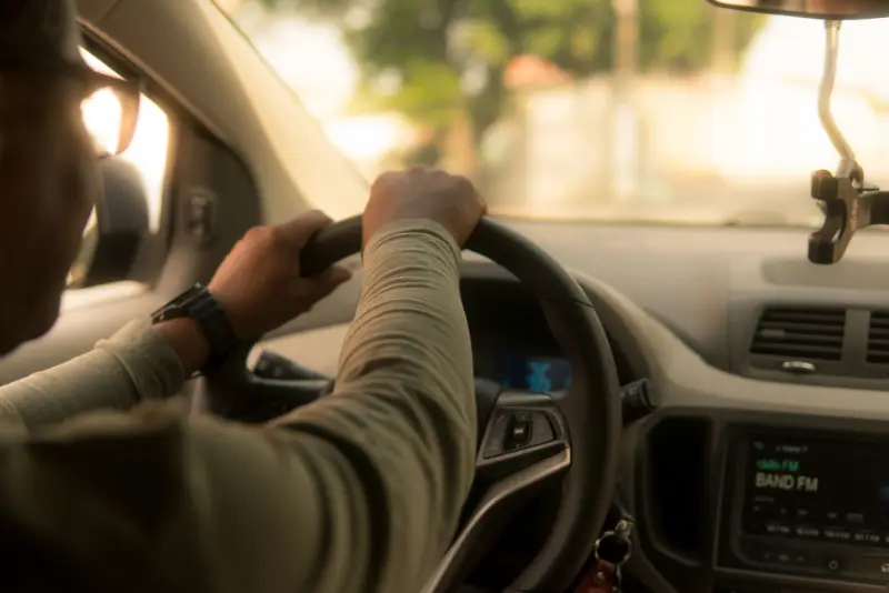 Passenger reviewing legal documents related to Uber sexual assault lawsuit and rideshare safety violations