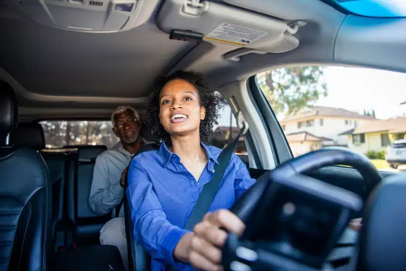 Passenger sitting alone after a traumatic rideshare assault experience while seeking legal support