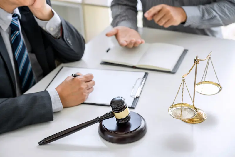 Courtroom scene featuring Judges Cherol Nellon and Carolyn Caietti in employment law context