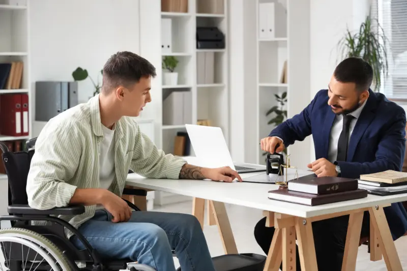 Personal injury lawyer for amputation injuries helping a client with recovery and compensation
